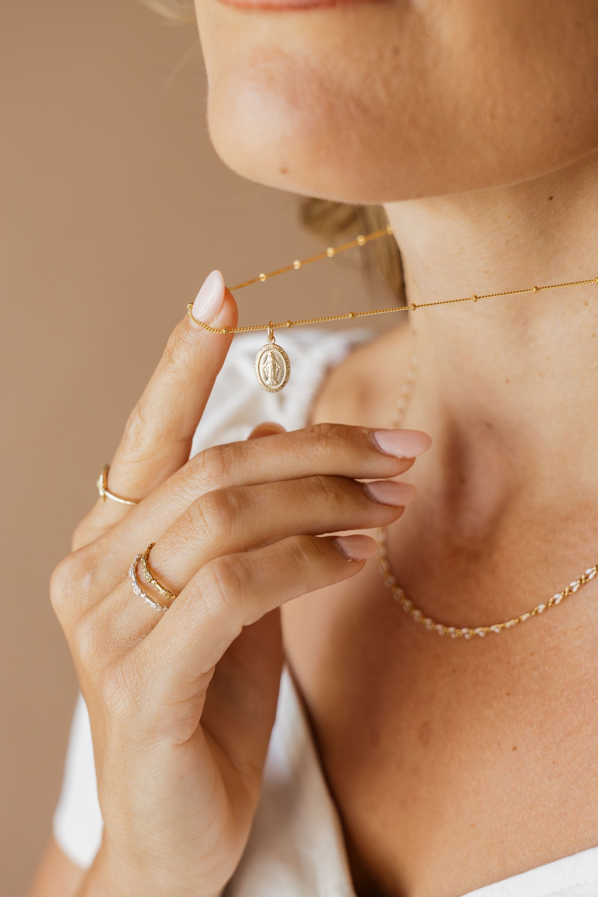 Miraculous Medal Jewelry in Gold and Silver