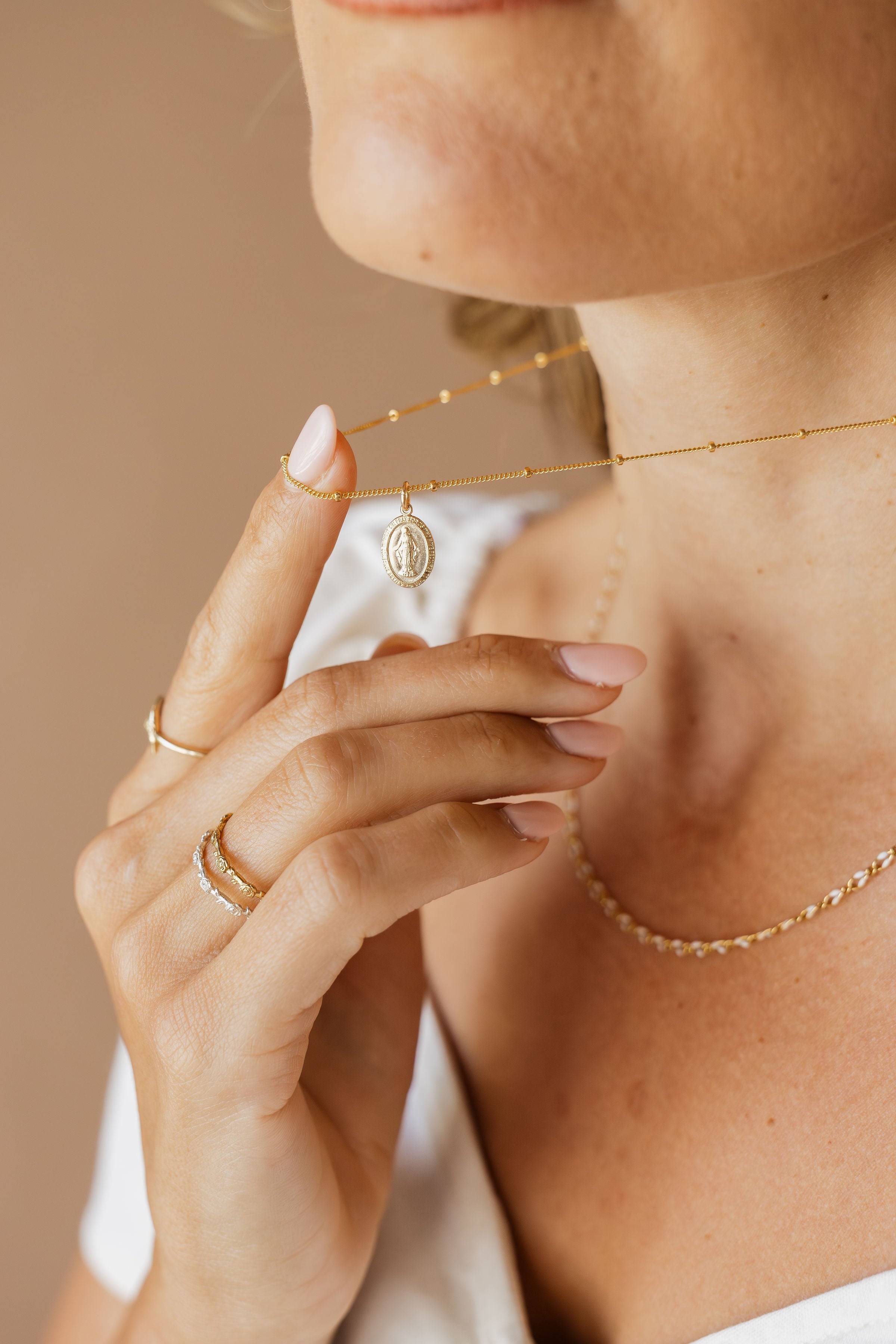 Miraculous Medal Jewelry in Gold and Silver